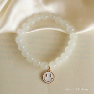 White Beaded Bracelet With Smiley Charm