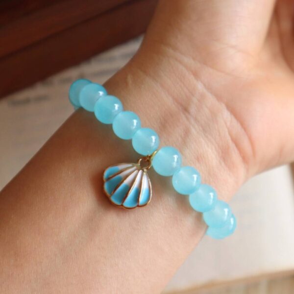 Sky Blue Beaded Bracelet With Sea Shell Charm