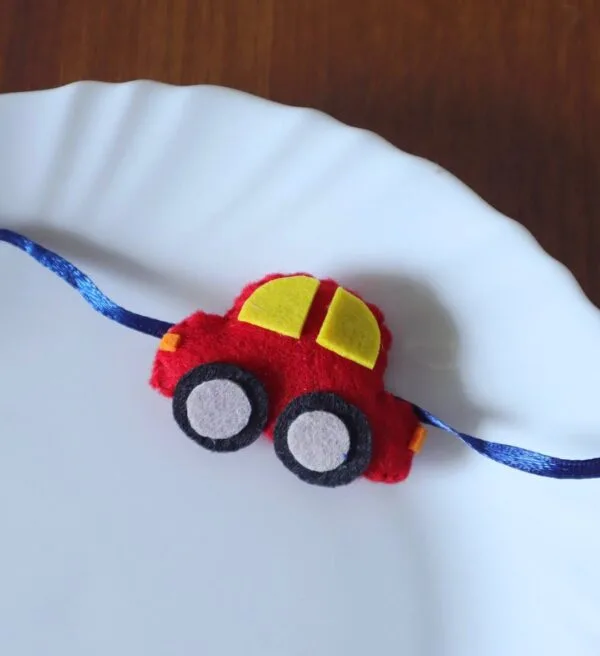 Handmade Red Car Rakhi for Little Brother