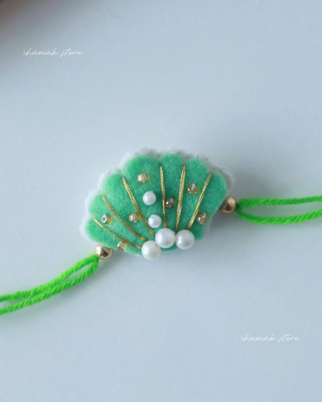 Handmade Green Pearl Shell Rakhi