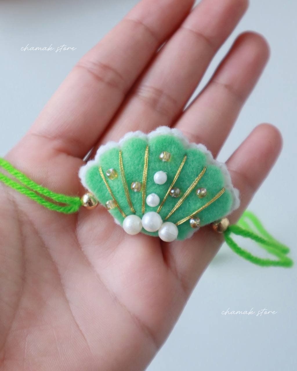 Handmade Green Pearl Shell Rakhi